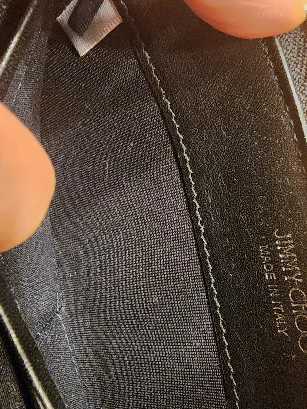 Jimmy Choo Filipa Star Studded Wallet, a black leather zip-around wallet